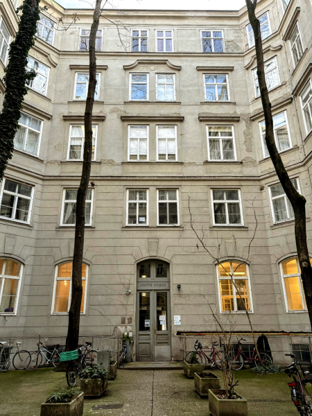 Vienna building courtyard with bikes parked outside.